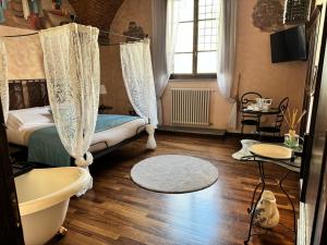 Posteľ alebo postele v izbe v ubytovaní Luxury Corte dei Nobili