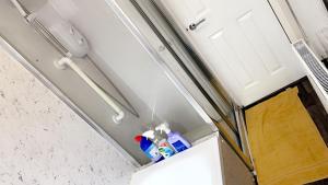 an overhead view of a refrigerator in a kitchen at Herbert - Duplex Relocations in Mexborough