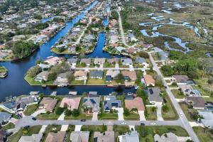an aerial view of a subdivision of houses next to a river at Collinson Sea Stone | Palm Coast in Palm Coast
