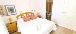Postel nebo postele na pokoji v ubytování Apartamento Playa Sol by DENIA COSTA