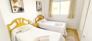 Postel nebo postele na pokoji v ubytování Apartamento Playa Sol by DENIA COSTA