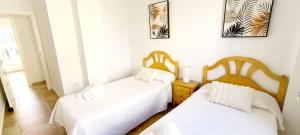 Postel nebo postele na pokoji v ubytování Apartamento Playa Sol by DENIA COSTA