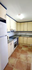 Kuchyň nebo kuchyňský kout v ubytování Apartamento Playa Sol by DENIA COSTA
