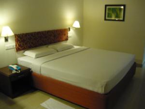 Postel nebo postele na pokoji v ubytování Hotel Malainn