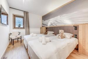 Posteľ alebo postele v izbe v ubytovaní Résidence Le Grand Bouquetin - 3 Pièces pour 6 Personnes MAE-0014 + 24 fotografií