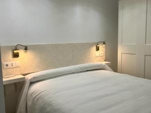 Postel nebo postele na pokoji v ubytování SANTA CLARA Con opción a Parking