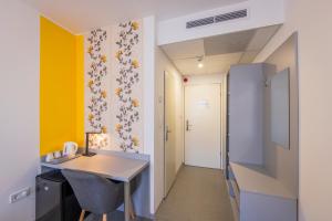 Kuchyňa alebo kuchynka v ubytovaní Arrabona Rooms
