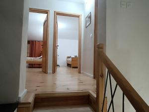 Postel nebo postele na pokoji v ubytování Villa Ema