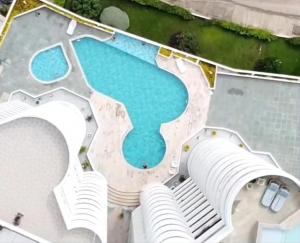 an aerial view of a resort with a swimming pool at Torres del lago Pegasus Group Cartagena in Cartagena de Indias