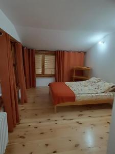 Postel nebo postele na pokoji v ubytování Villa Ema