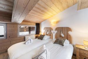 Ένα ή περισσότερα κρεβάτια σε δωμάτιο στο Résidence Floreal - 3 Pièces pour 4 Personnes 264