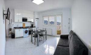 Kuchyň nebo kuchyňský kout v ubytování Apartamentos Costas de Bueu B