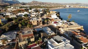an aerial view of a town next to the water at Almejas B in San Carlos