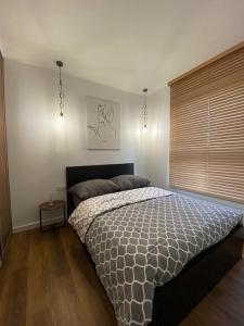 Ένα ή περισσότερα κρεβάτια σε δωμάτιο στο Apart Vabi