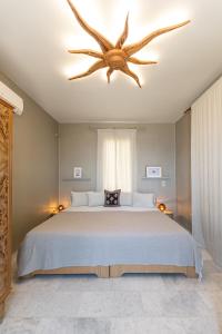 A bed or beds in a room at Helios Selene