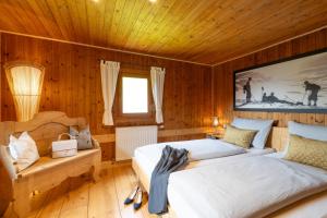 A bed or beds in a room at Chalet Kasern