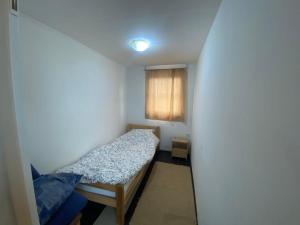 Posteľ alebo postele v izbe v ubytovaní Kuća SFRJ Šamac