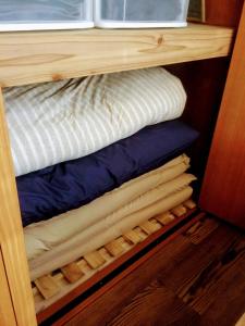 Ein Bett oder Betten in einem Zimmer der Unterkunft Yoron Tandy-House - Vacation STAY 78660v