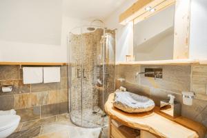 Koupelna v ubytování Hotel Piz Seteur