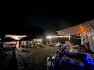 a building with lights on it at night at The Basecamp Yugawara - Vacation STAY 84742v in Miyakami