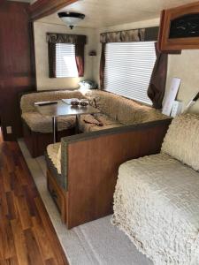 an rv with a bed and a table in it at The Basecamp Yugawara - Vacation STAY 84742v in Miyakami