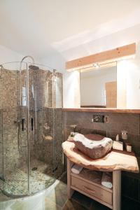 Koupelna v ubytování Hotel Piz Seteur