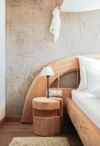 Postel nebo postele na pokoji v ubytování Hotel Piz Seteur