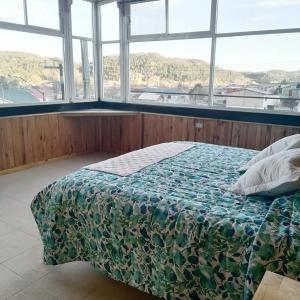 Postel nebo postele na pokoji v ubytování Rimusa Inn