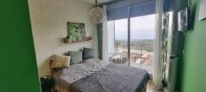 Llit o llits en una habitació de Peñiscola - Casa Mirador mit Gemeinschaftspool