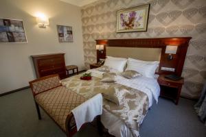 Ein Bett oder Betten in einem Zimmer der Unterkunft Hotel SKY CENTR Krasnoyarsk