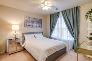 a bedroom with a bed and a window at Spacious Woodbridge Home Near Leesylvania Park! in Woodbridge