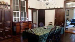 a dining room with a table and chairs at Mountain Home Bed & Breakfast in Front Royal