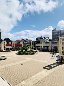 a large square in a city with buildings at Résidence Les Océanes - maeva Home - Studio 5 Personnes Confort - vue mer MAE-5816 in Pornichet