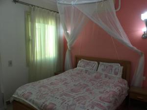 Postel nebo postele na pokoji v ubytování Sharks Bay Oasis Apartment Sharm El sheik