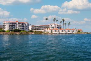 a view of a resort from the water at Loews Coronado Bay Resort in San Diego