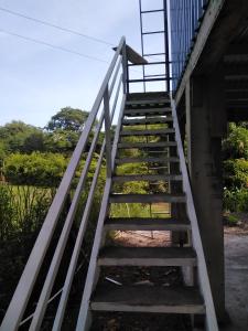 eine Treppe, die zu einem Gebäude führt in der Unterkunft Estudio Curime in Curime