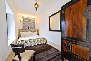 Postel nebo postele na pokoji v ubytování Riad Porte Royale