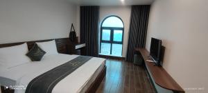 Postel nebo postele na pokoji v ubytování LS HOTEl