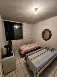 מיטה או מיטות בחדר ב-Solar da Sereia