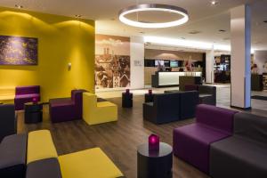 Uma área de estar em Star G Hotel Premium München Domagkstraße