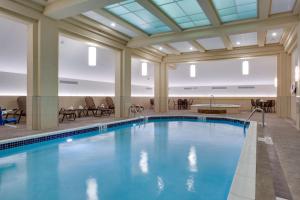 a large swimming pool in a hotel lobby at Drury Plaza Hotel Pittsburgh Downtown in Pittsburgh