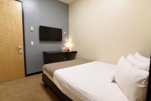 Letto o letti in una camera di Hotel Dunas Near Consulate