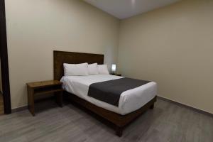 Letto o letti in una camera di Hotel Dunas Near Consulate