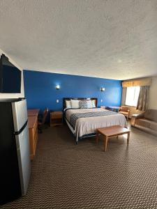 מיטה או מיטות בחדר ב-Eco-Lux Inn Norfolk