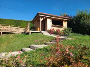 a small house on a hill with stairs in front at Gîte Contrexéville, 2 pièces, 4 personnes - FR-1-589-57 in Contrexéville