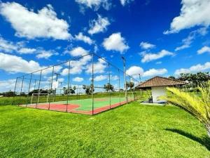 a batting cage on a baseball field at Apartamento Térreo no Catu Lake Resort Aquiraz in Aquiraz