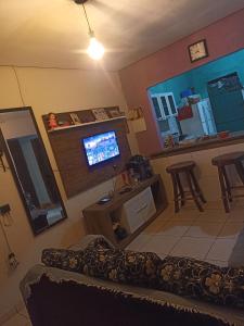 Телевизор и/или развлекательный центр в Casa da Ilsinha