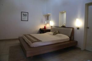 Кровать или кровати в номере Sunny Villa