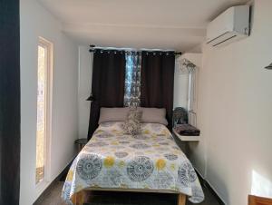 Giường trong phòng chung tại Container-Suite