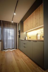 Kuchyň nebo kuchyňský kout v ubytování WOLF Apartments Padaun